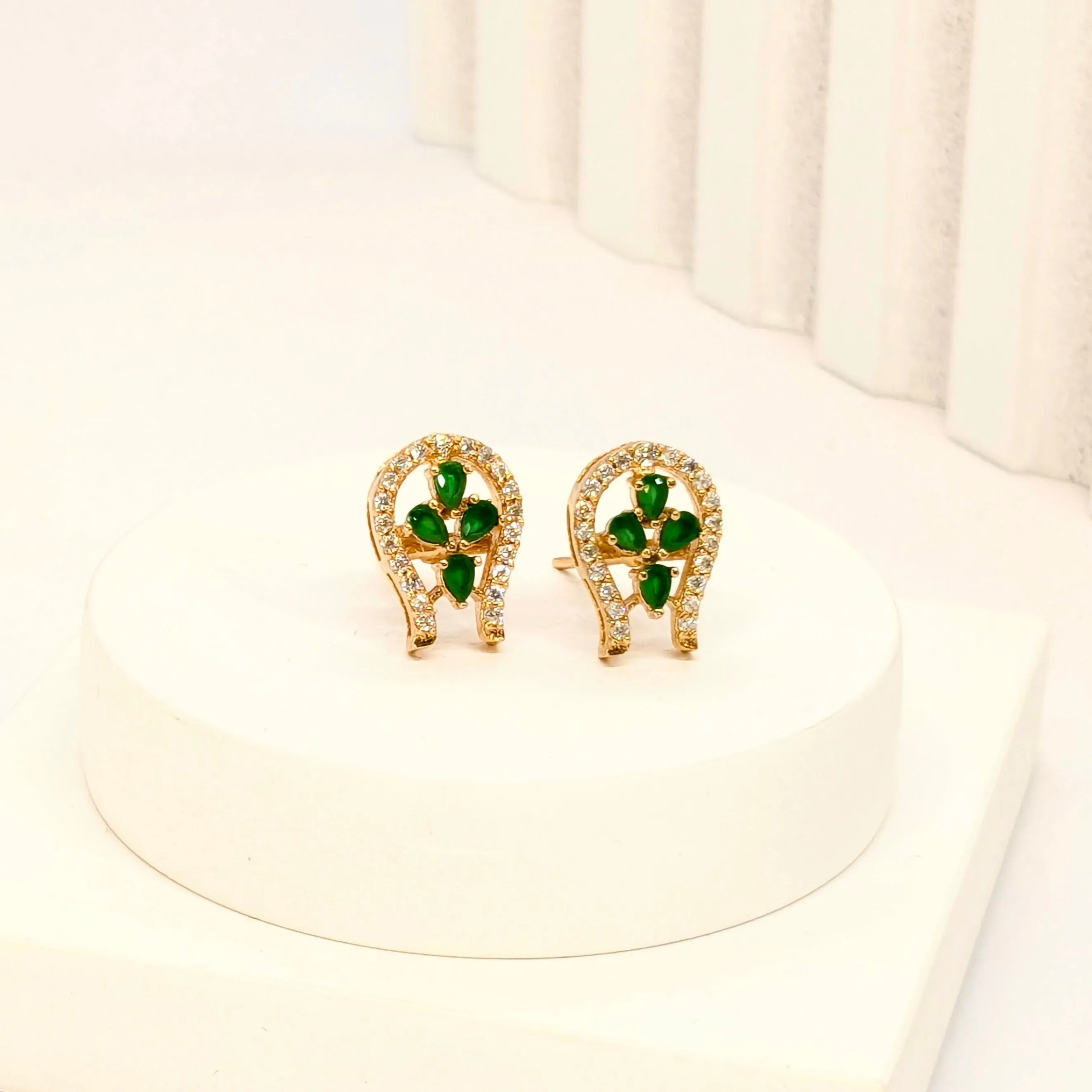 U-Shaped Stud Earrings With White AD and Green Crystals